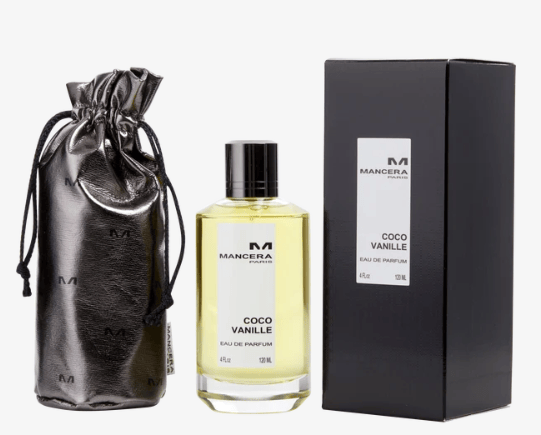 A bottle of Mancera Coco Vanille Eau de Parfum set, featuring a clear glass bottle, black drawstring pouch, and a black box with white branding.
